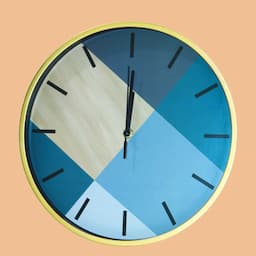 ساعة حائط دائرية بتصاميم متنوعة 1